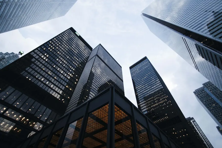Premium glass towers reflecting an evening skyline